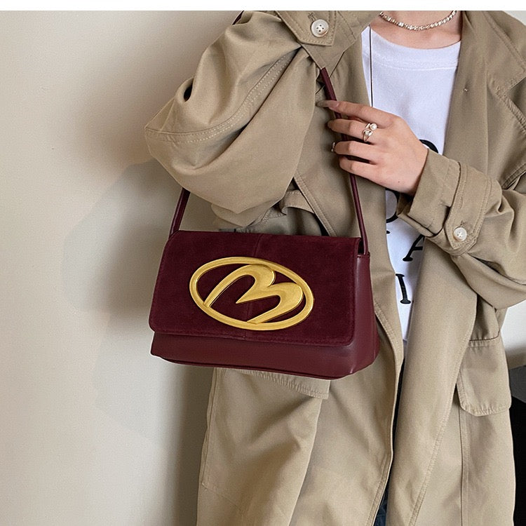 CREST SUEDE STATEMENT SHOULDER SLINGBAG