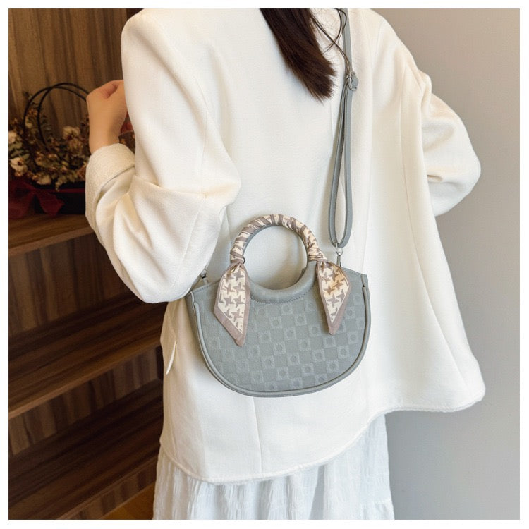Twist 2-in-1 Handy + Crossbody Bag