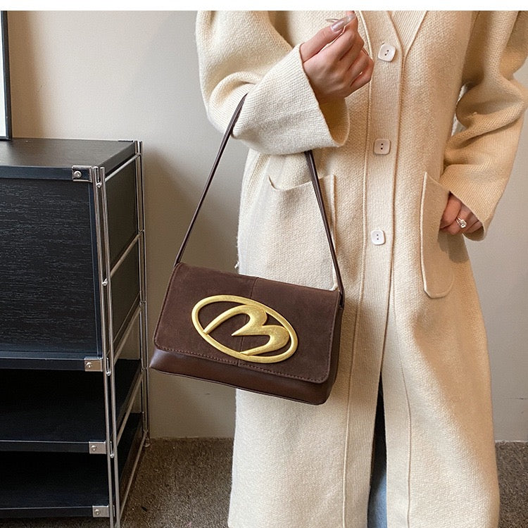 CREST SUEDE STATEMENT SHOULDER SLINGBAG