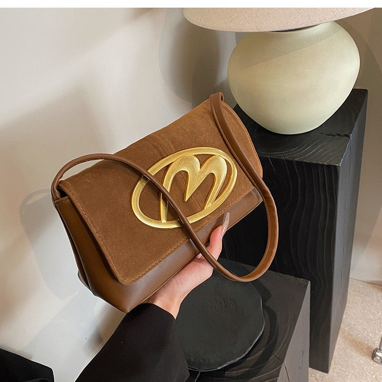 CREST SUEDE STATEMENT SHOULDER SLINGBAG